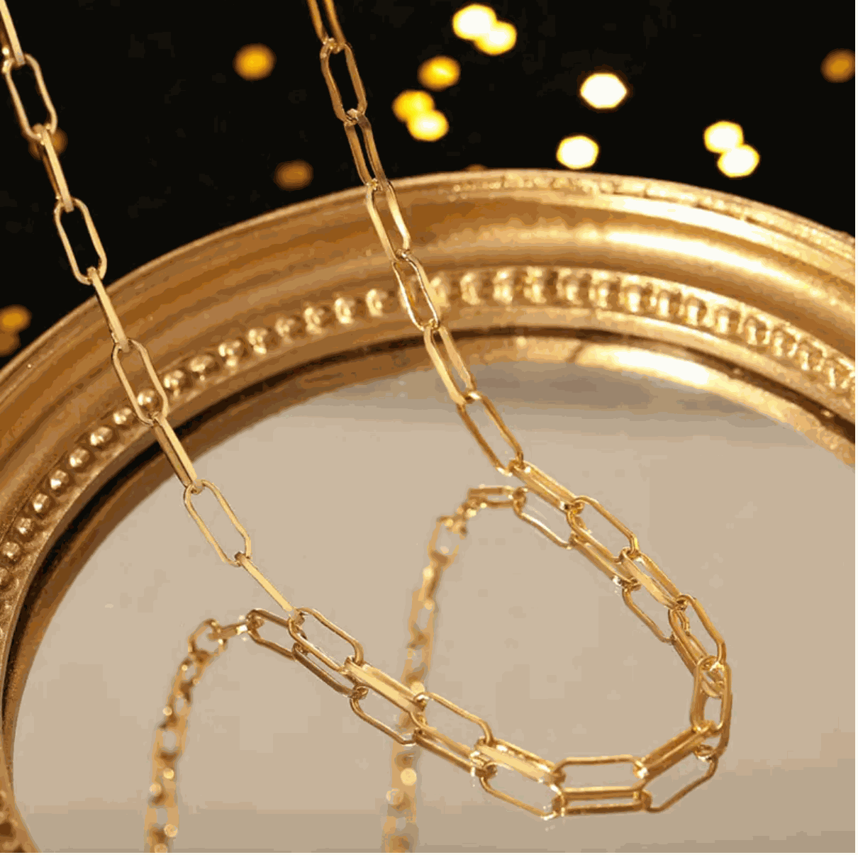 Sleek Golden Link Luxe Chain Necklace displayed elegantly, highlighting elongated rectangular links in radiant gold.